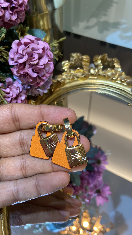 H ORANGE LOCK EARRING