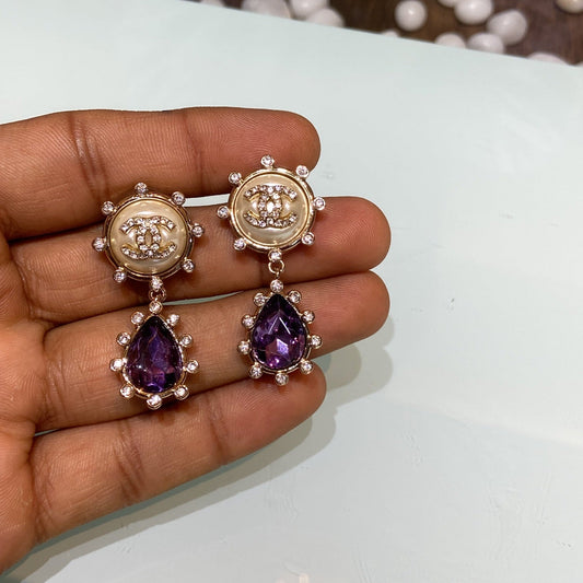 CC purple diamond earrings