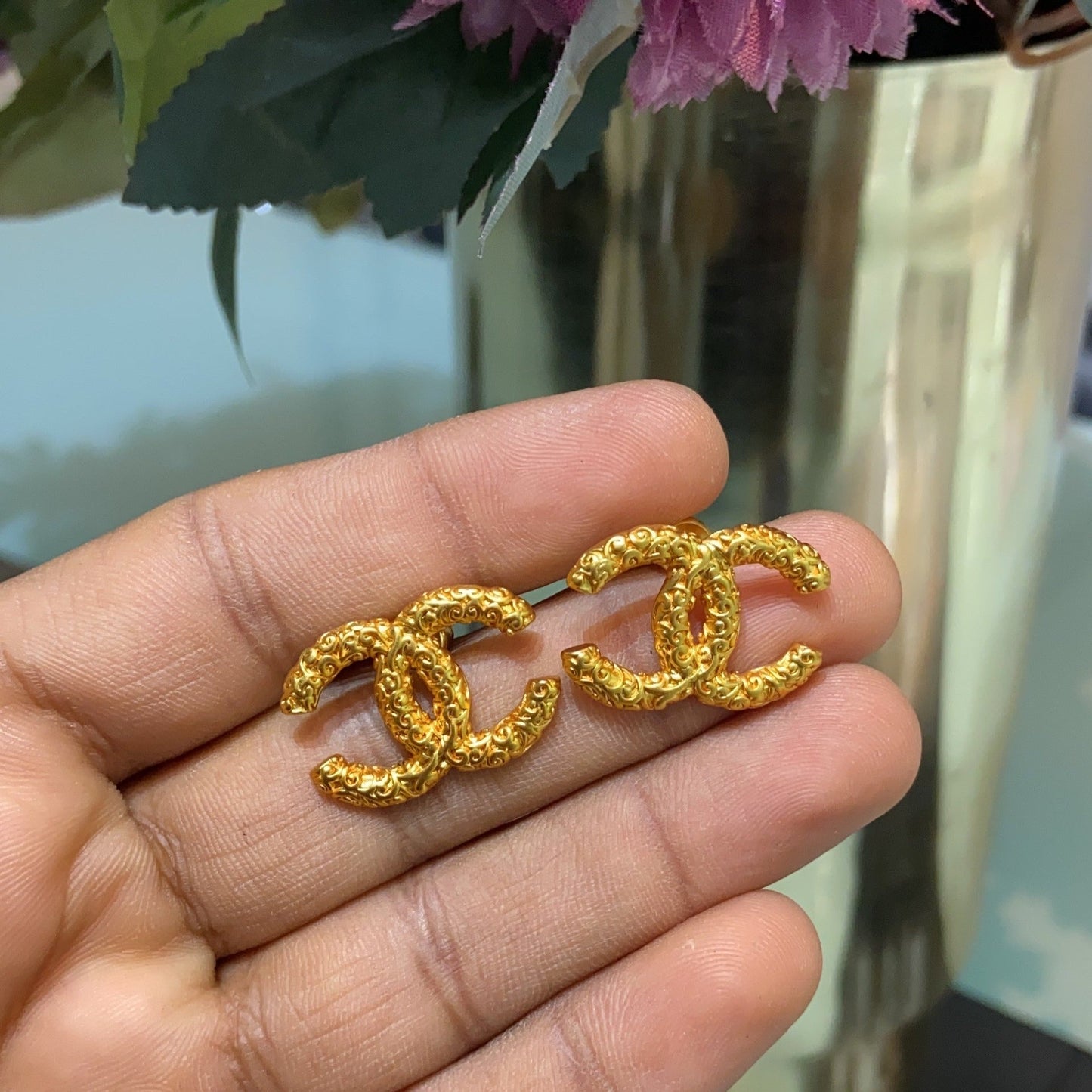 CC gold texture earrings