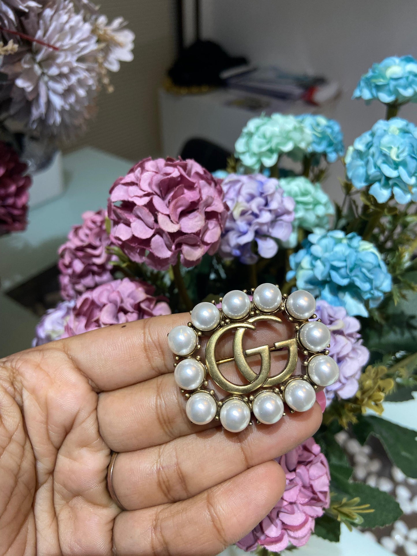 GG pearl brooch