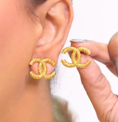 CC gold texture earrings